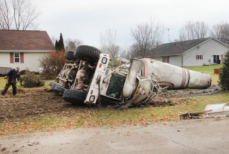 Cement Truck Overturns On Lake Drive